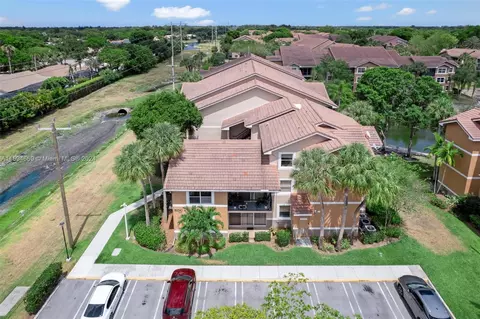 9033 Wiles Rd #107, Coral Springs, FL 33067