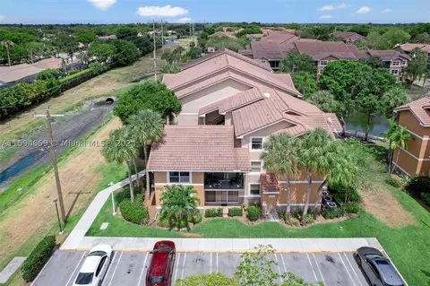 9033 Wiles Rd #107, Coral Springs, FL 33067