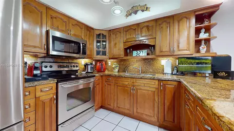 Kitchen - 6880 W 2nd Ln #6880, Hialeah, FL 33014 photo 4 of 4