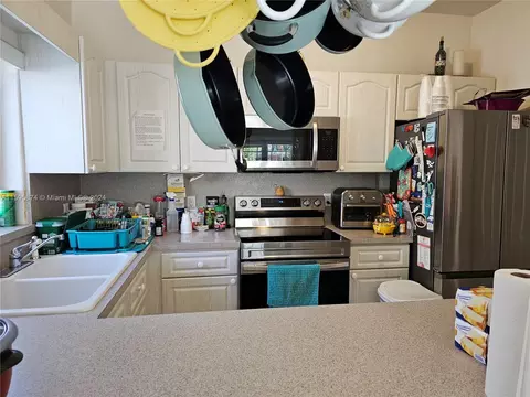 Kitchen - 488 SE 4th St, Hialeah, FL 33010 photo 2 of 2