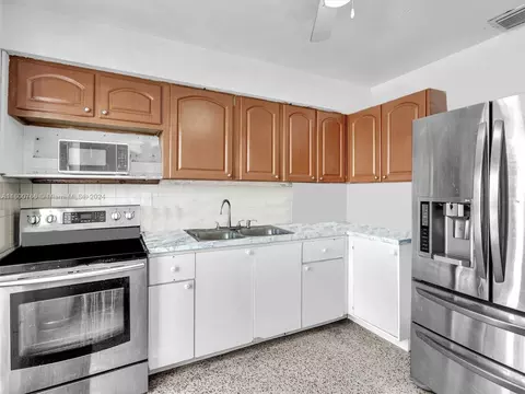 Kitchen - 492 E 28th St, Hialeah, FL 33013 photo 4 of 10