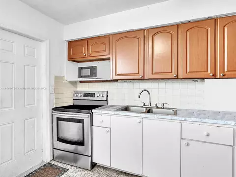 Kitchen - 492 E 28th St, Hialeah, FL 33013 photo 5 of 10