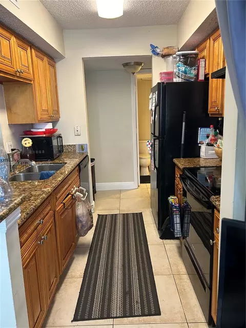 5760 Rock Island Rd #338, Tamarac, FL 33319
