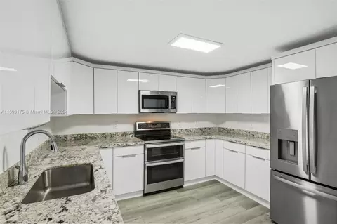 Kitchen - 511 Forrest Dr, Miami Springs, FL 33166 photo 1 of 3