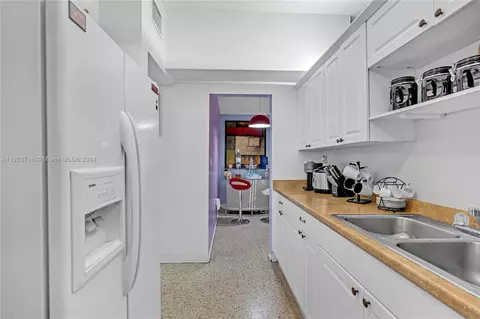 Kitchen - 5100 E 8th Ave, Hialeah, FL 33013 photo 1 of 2