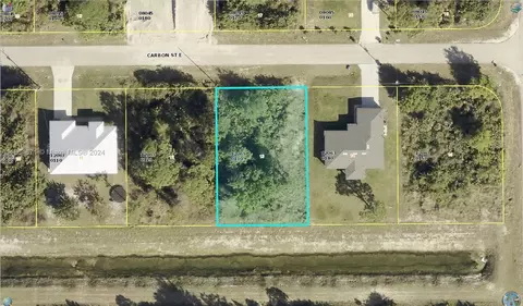 870 Carbon St E, Lehigh Acres, FL 33974