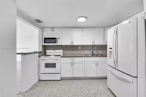 Kitchen - 969 W 77th St, Hialeah, FL 33014 photo 1 of 2