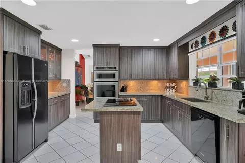 Kitchen - 15765 SW 153rd Ct, Miami, FL 33187 photo 1 of 4