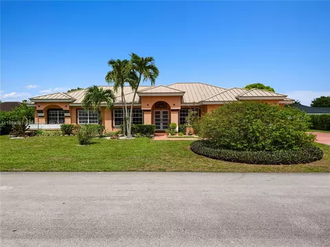 Exterior - 15765 SW 153rd Ct, Miami, FL 33187 photo 1 of 14