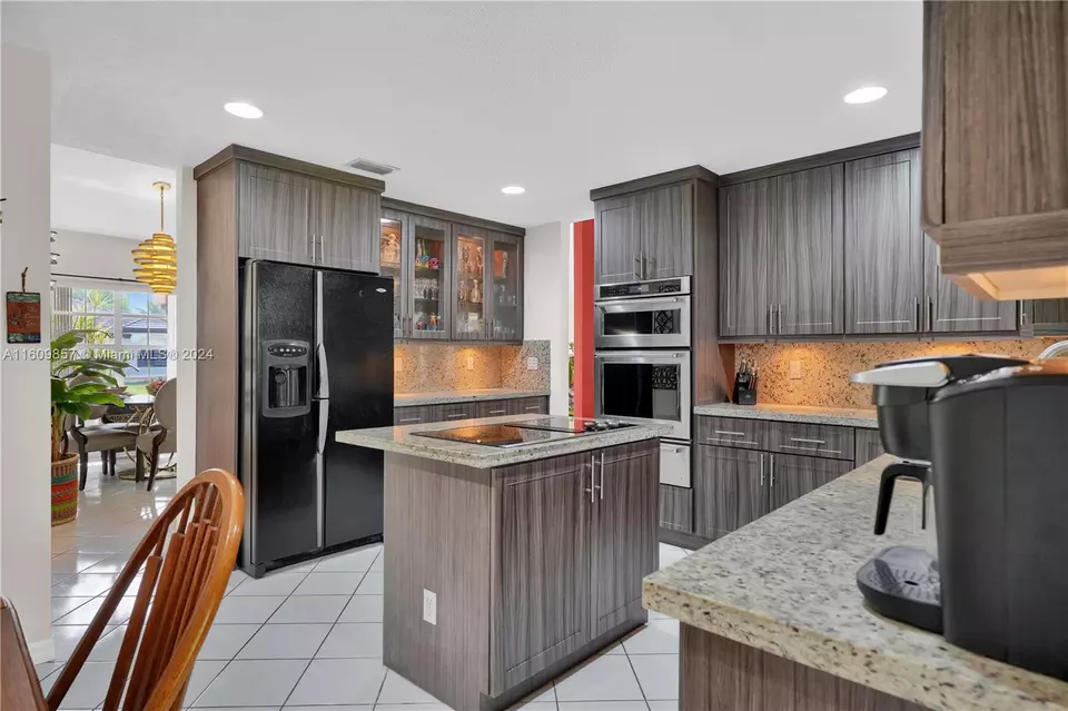 Kitchen - 15765 SW 153rd Ct, Miami, FL 33187 photo 3 of 4