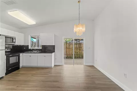 Living - 3172 W 71st Pl, Hialeah, FL 33018 photo 6 of 9
