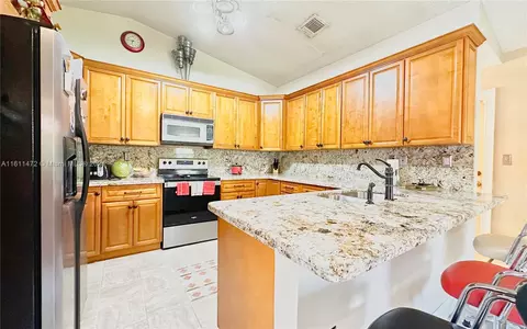 Kitchen - 20007 NW 58th Pl, Hialeah, FL 33015 photo 3 of 3