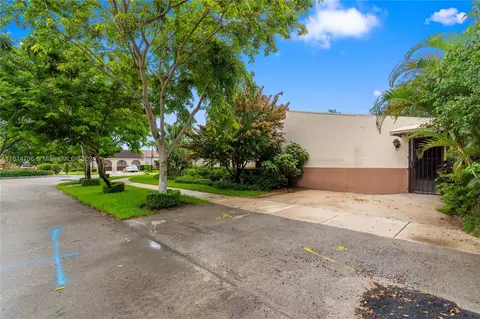 Exterior - 7266 Jacaranda Ln, Miami Lakes, FL 33014 photo 4 of 13