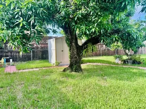 Exterior - 5490 W 12th Ln, Hialeah, FL 33012 photo 6 of 7