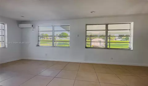 Living - 630 W 53rd St, Hialeah, FL 33012 photo 2 of 2