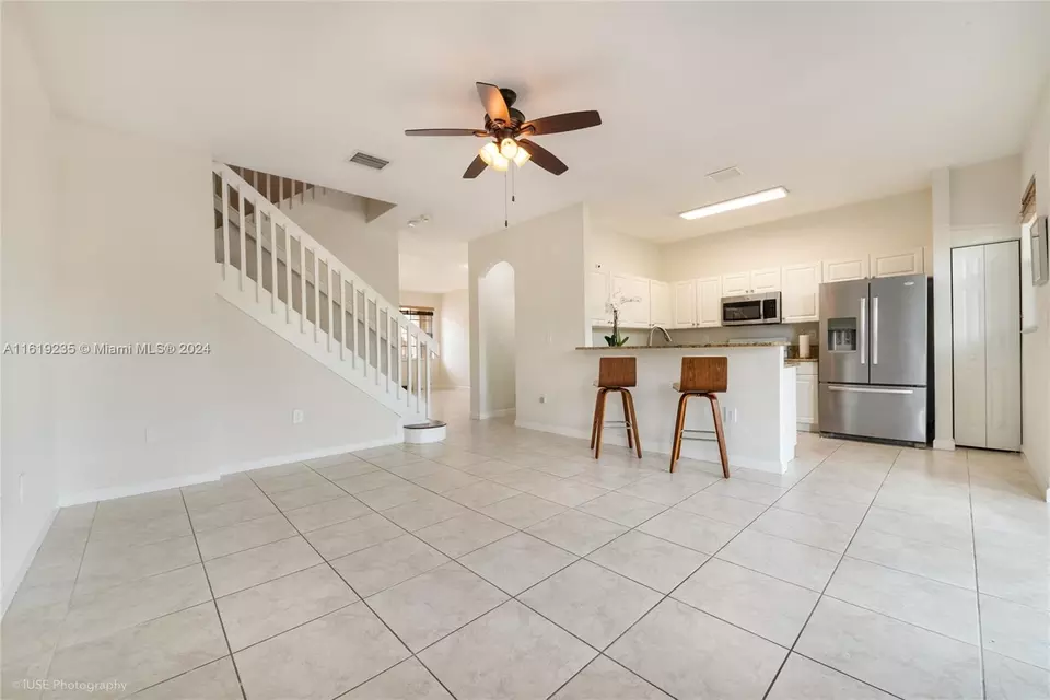 Living - 12929 SW 132 Ter, Miami, FL 33186 photo 3 of 5