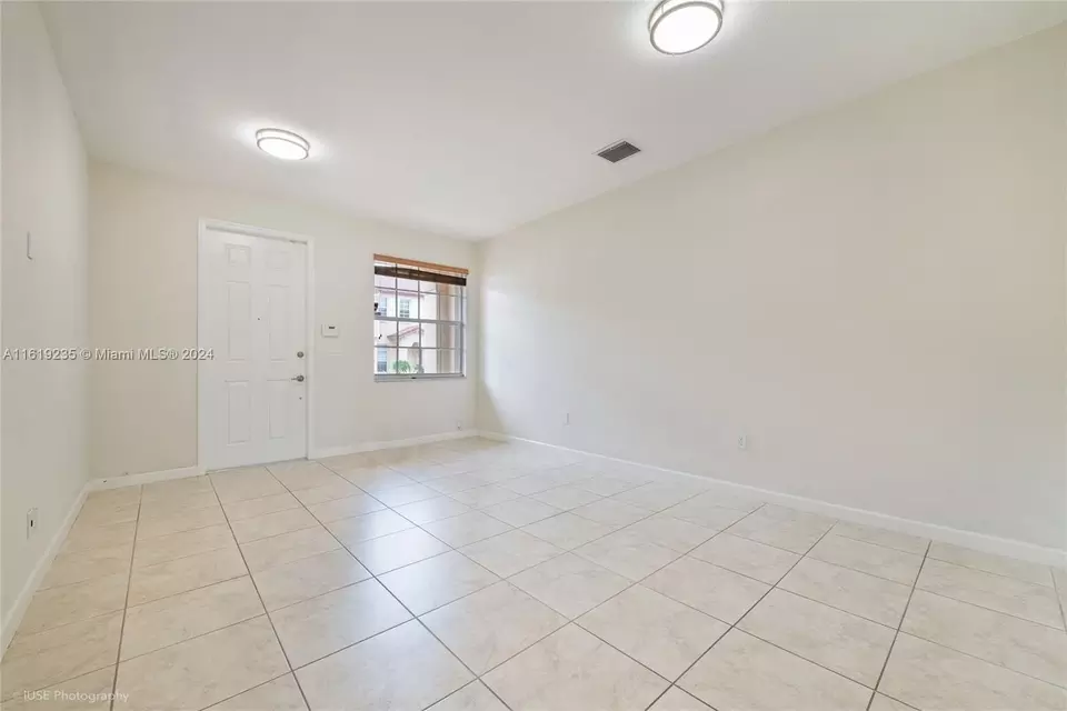 Living - 12929 SW 132 Ter, Miami, FL 33186 photo 1 of 5