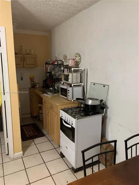 Kitchen - 590 E 40th St, Hialeah, FL 33013 photo 4 of 4