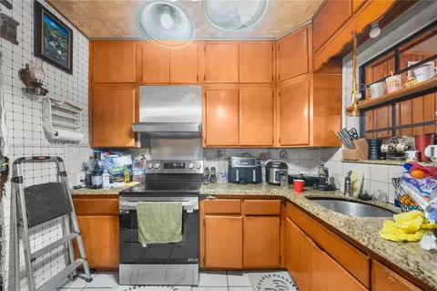 Kitchen - 271 E 57th St, Hialeah, FL 33013 photo 2 of 3