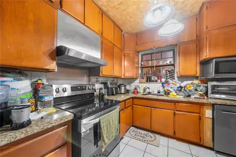 Kitchen - 271 E 57th St, Hialeah, FL 33013 photo 3 of 3