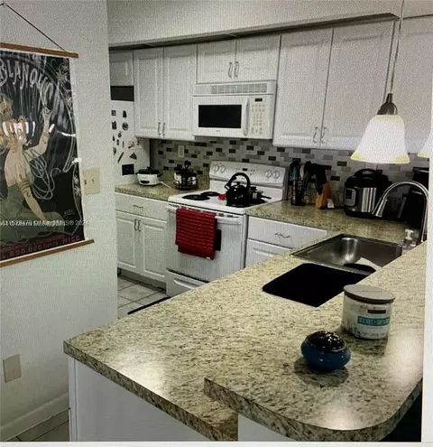 8670 SW 212th St #104, Cutler Bay, FL 33189