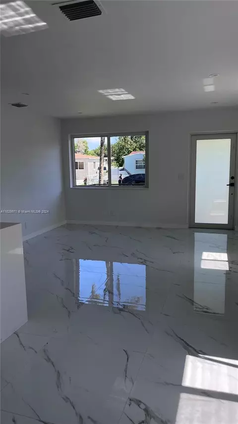 Living - 971 NE 155th Ter, North Miami Beach, FL 33162 photo 2 of 2