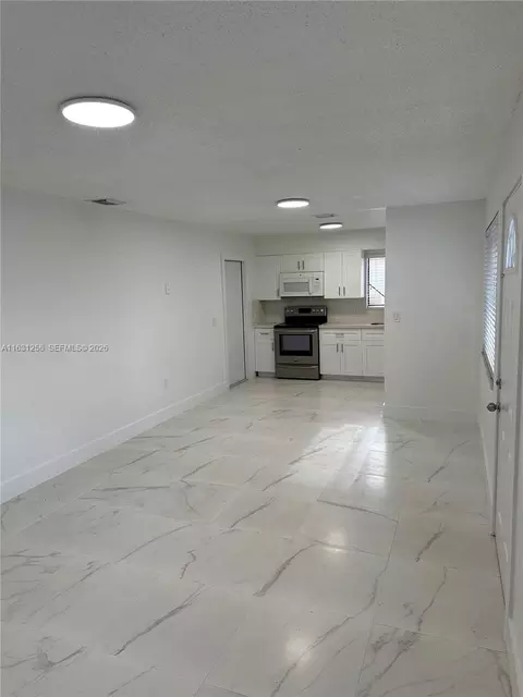 Living - 324 E 34th St, Hialeah, FL 33013 photo 11 of 11