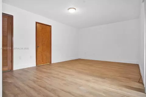 Living - 324 E 34th St, Hialeah, FL 33013 photo 8 of 11