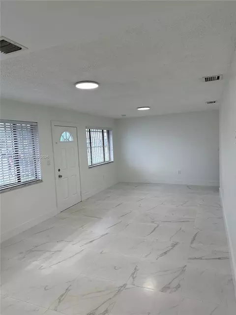 Living - 324 E 34th St, Hialeah, FL 33013 photo 9 of 11