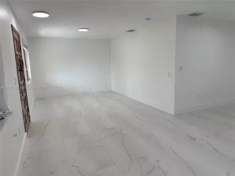 Living - 324 E 34th St, Hialeah, FL 33013 photo 7 of 11