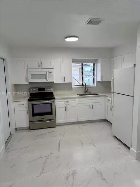 Kitchen - 324 E 34th St, Hialeah, FL 33013 photo 2 of 2