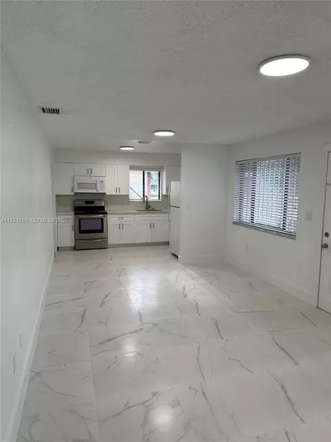 Living - 324 E 34th St, Hialeah, FL 33013 photo 10 of 11