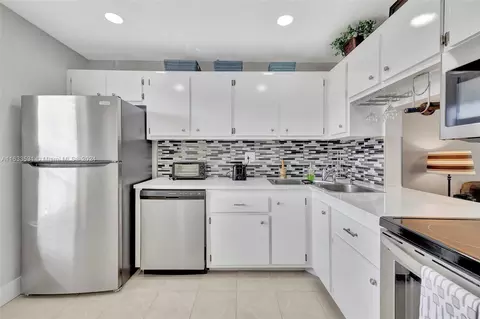 6051 NW 61st Ave #203, Tamarac, FL 33319