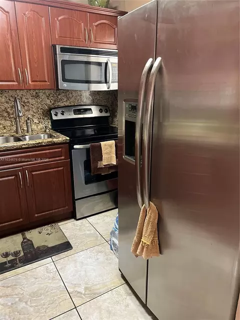 Kitchen - 180 E 62nd St, Hialeah, FL 33013 photo 3 of 5