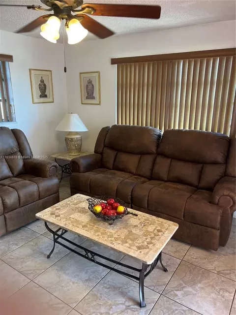 Living - 180 E 62nd St, Hialeah, FL 33013 photo 1 of 2