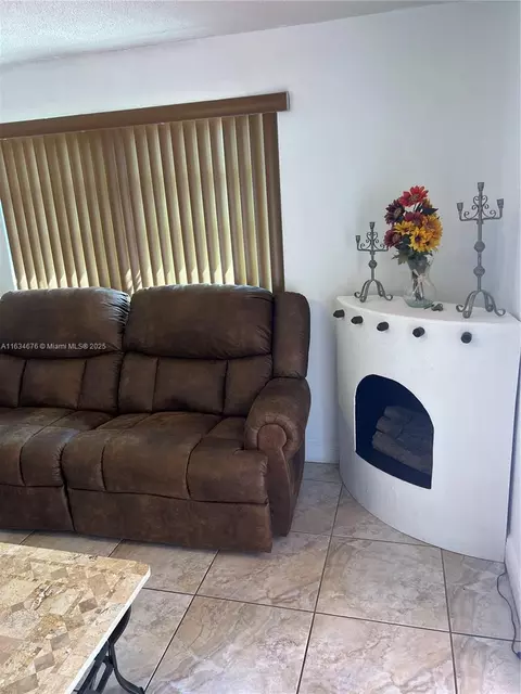 Living - 180 E 62nd St, Hialeah, FL 33013 photo 2 of 2