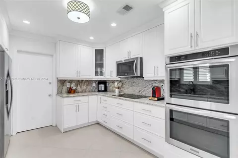 Kitchen - 1295 Thrush Ave, Miami Springs, FL 33166 photo 1 of 4