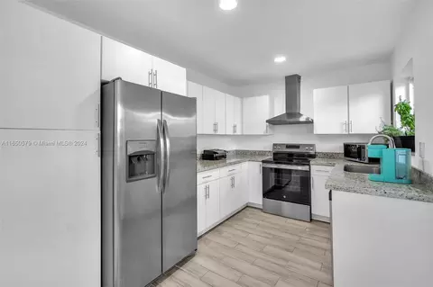 Kitchen - 5750 E 3rd Ave, Hialeah, FL 33013 photo 1 of 2