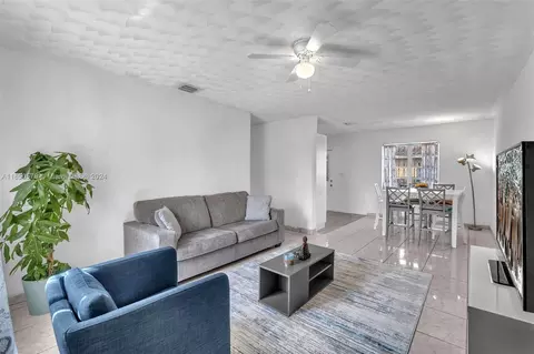 Living - 5750 E 3rd Ave, Hialeah, FL 33013 photo 1 of 2