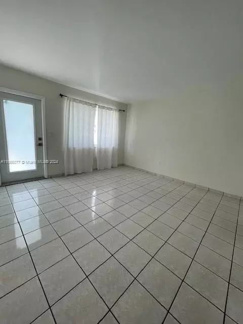 Living - 871 SE 3rd Pl, Hialeah, FL 33010 photo 2 of 2