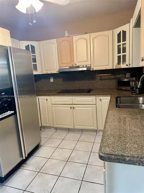 Kitchen - 4080 W 7th Ln, Hialeah, FL 33012 photo 1 of 3