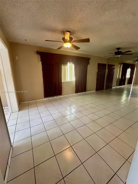 Living - 4080 W 7th Ln, Hialeah, FL 33012 photo 3 of 4