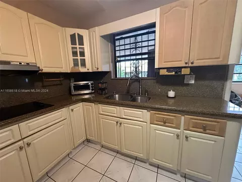 Kitchen - 4080 W 7th Ln, Hialeah, FL 33012 photo 3 of 3