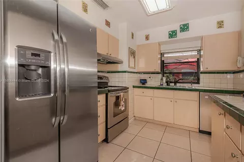 Kitchen - 150 E 38th St, Hialeah, FL 33013 photo 2 of 4