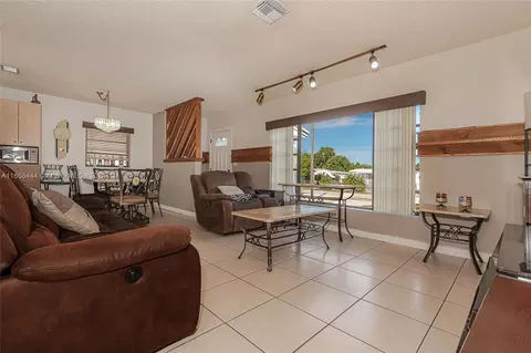 Living - 150 E 38th St, Hialeah, FL 33013 photo 2 of 3
