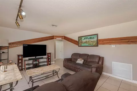 Living - 150 E 38th St, Hialeah, FL 33013 photo 1 of 3