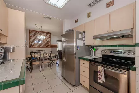 Kitchen - 150 E 38th St, Hialeah, FL 33013 photo 3 of 4