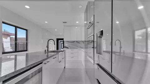 Kitchen - 242 E 16th St, Hialeah, FL 33010 photo 3 of 3