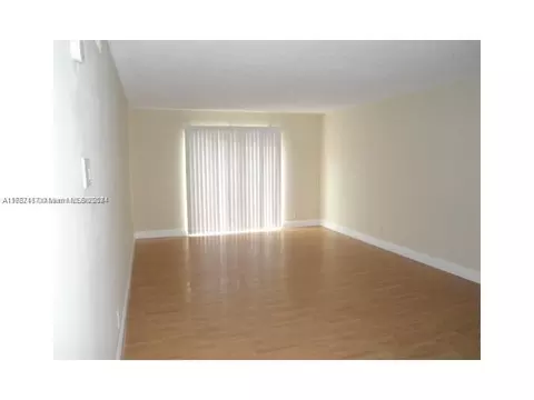 Living - 18101 NW 68th Ave #D210, Hialeah, FL 33015 photo 3 of 3