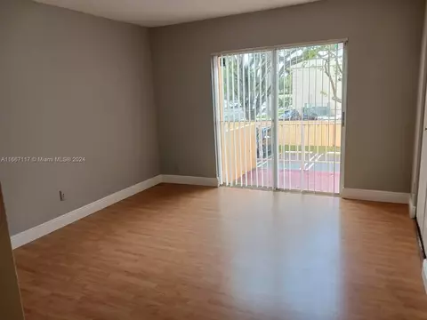 Living - 18101 NW 68th Ave #D210, Hialeah, FL 33015 photo 2 of 3